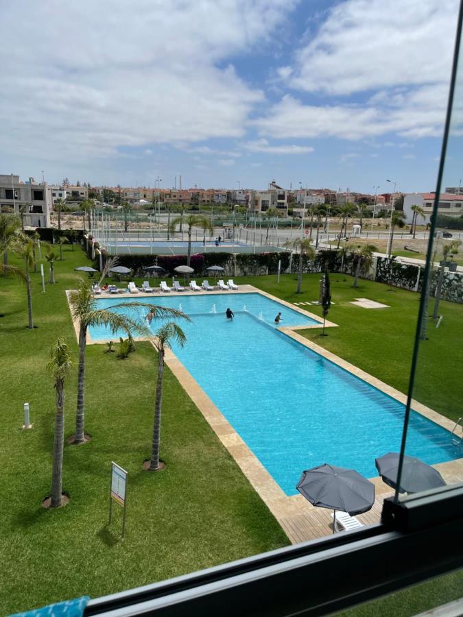 Bel Appartement Pied Sur Mer Vue Imprenable Sur Piscine Et Jardins ซิดิ ราฮาล ภายนอก รูปภาพ