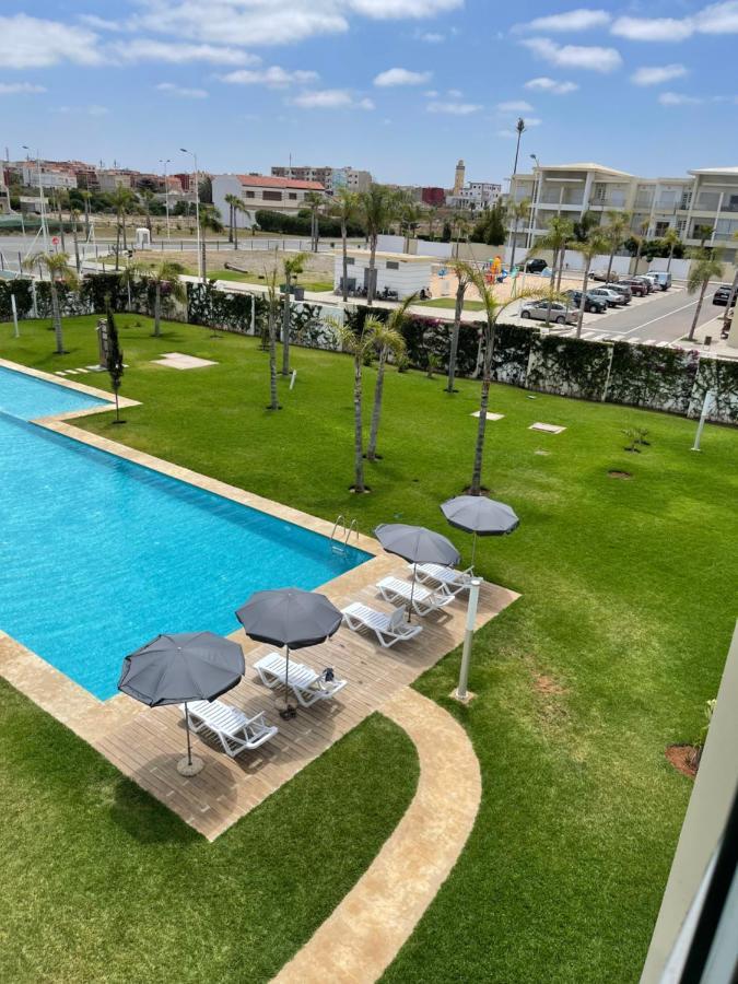 Bel Appartement Pied Sur Mer Vue Imprenable Sur Piscine Et Jardins ซิดิ ราฮาล ภายนอก รูปภาพ