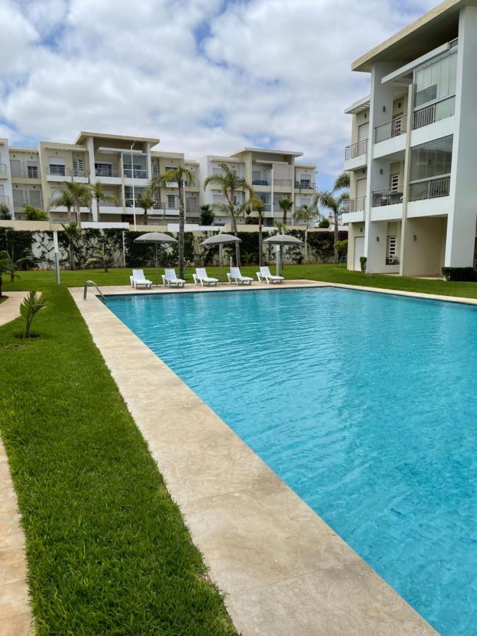 Bel Appartement Pied Sur Mer Vue Imprenable Sur Piscine Et Jardins ซิดิ ราฮาล ภายนอก รูปภาพ