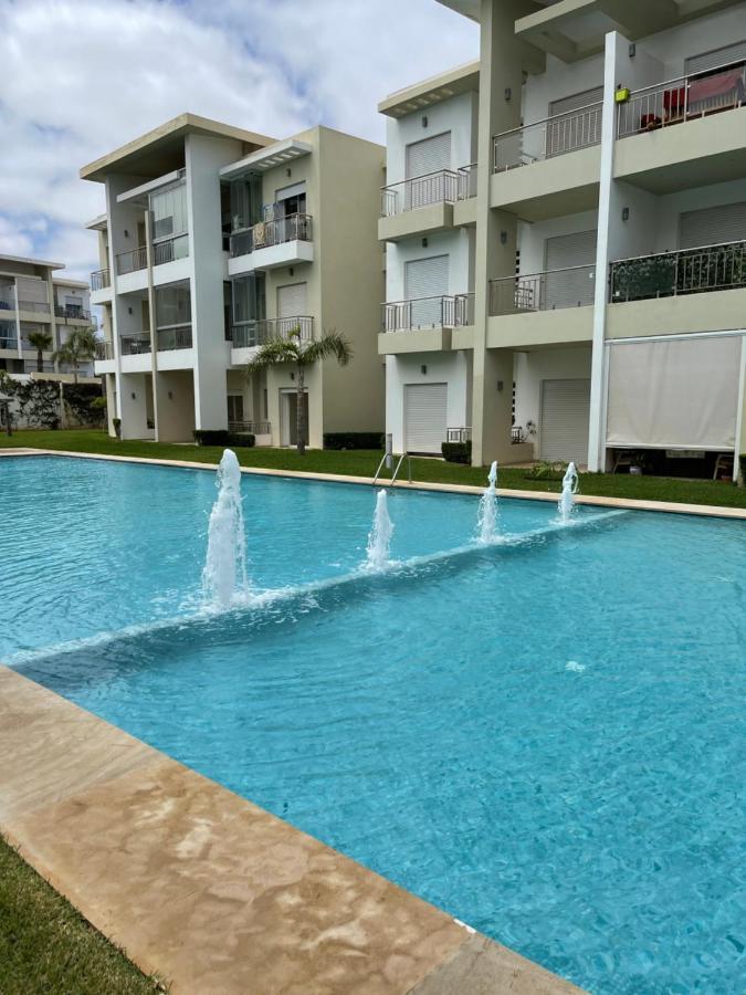 Bel Appartement Pied Sur Mer Vue Imprenable Sur Piscine Et Jardins ซิดิ ราฮาล ภายนอก รูปภาพ