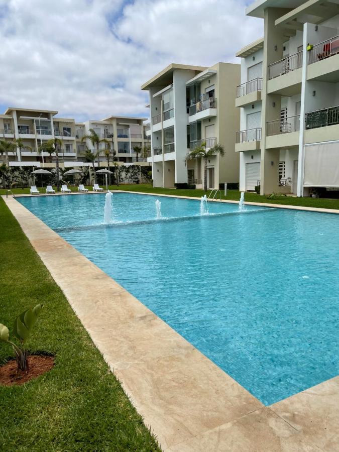 Bel Appartement Pied Sur Mer Vue Imprenable Sur Piscine Et Jardins ซิดิ ราฮาล ภายนอก รูปภาพ