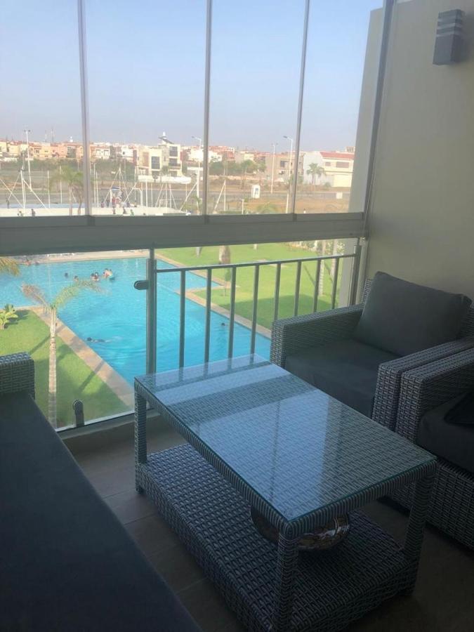 Bel Appartement Pied Sur Mer Vue Imprenable Sur Piscine Et Jardins ซิดิ ราฮาล ภายนอก รูปภาพ